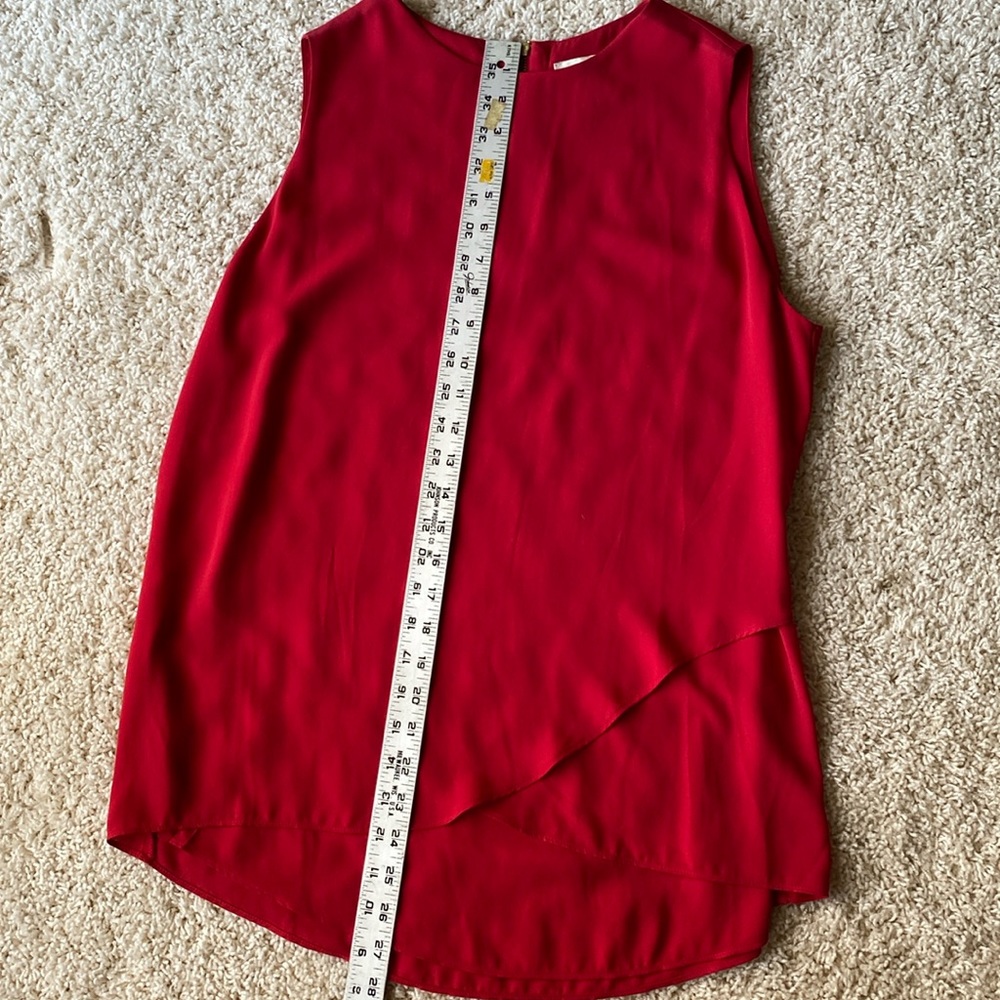Ladies, red sleeveless top from Chicos size one